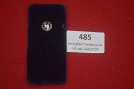 German Third Reich small circular pin badge, gilt metal, mounted on original velvet-covered card