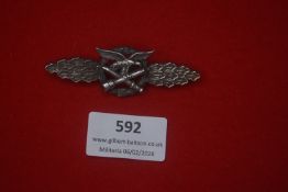 Third Reich Luftwaffe clasp-style badge, oval wreath with central motif, horizontal pin-back