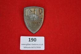 German Bavarian commemorative badge, shield-shaped, depicting a castle and trumpet motif,