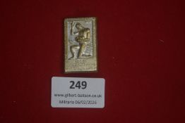 German youth or hiking commemorative badge, rectangular form depicting a kneeling youth figure,