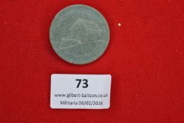 German Annaberg local commemorative badge, circular pressed alloy depicting a building, marked “