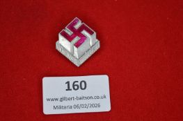 German National Socialist rally badge, three-dimensional form depicting a red enamelled swastika