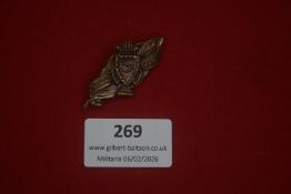 German veterans’ association badge featuring a shield and crossed banners with heraldic device and