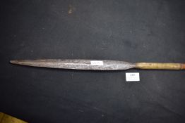 European polearm spear head on wooden haft, leaf-shaped double-edged blade with central ridge,