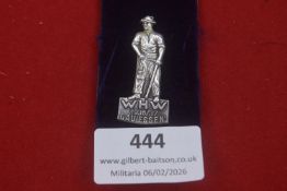 Third Reich Winter Relief Organisation (WHW) tinnie, dated 1936/37, depicting a standing labourer