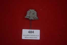 Two German Third Reich commemorative stick pins, both featuring steel helmet and Iron Cross