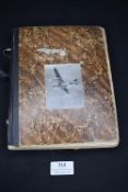 WWII-era scrapbook album, extensively compiled with contemporary newspaper cuttings, photographs and