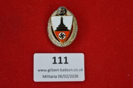 German Third Reich political service badge, oval silvered wreath enclosing enamelled shield with