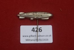 Third Reich Zeppelin-Eckener-Spende tinnie, airship form with raised inscription, complete with long