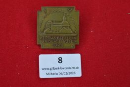 German Verbandfest Sonderhausen badge, dated 1929, bronze example depicting architectural scene