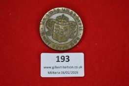 German patriotic commemorative tinnie, circular form bearing a crowned quartered coat of arms to