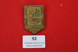 German regional commemorative badge, shield-shaped depicting townscape vignette, inscribed “