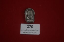 German commemorative badge marked “Wiedershenstfest Bautsch 1–15.8.1935”, depicting architectural