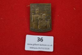 German Reichsbundfest Straubing commemorative badge, rectangular bronze-toned example depicting male