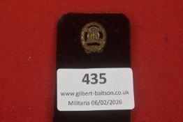 Third Reich German Labour Front (DAF) Membership Badge, gilt example featuring the DAF cogwheel with