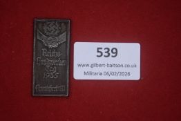 Reichshandwerkertag Frankfurt 1935 tinnie, rectangular dark metal example depicting clasped hands