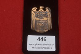 Third Reich Winter Relief (WHW) donation badge dated 1934/35, bearing the inscription “Dem