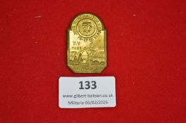 German gymnastic association commemorative badge, shield-shaped gilt issue depicting landscape and