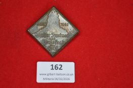 German Third Reich-era commemorative tinnie, diamond-shaped, inscribed “Leipziger Sportwoche und