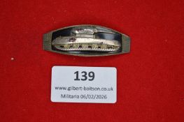 German armoured forces souvenir or veterans’ badge, elongated oval metal plaque depicting tracked