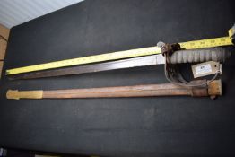 British cavalry sword with single-edged blade, plain blade with central fuller, steel hilt with