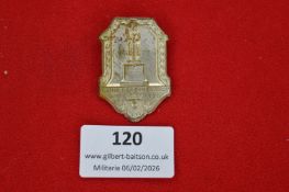 German civic memorial badge, shield-shaped white metal plaque depicting war memorial monument,