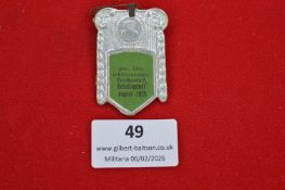 German Schützenfest commemorative badge, silvered metal example with green inset panel inscribed “