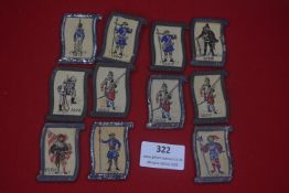 A group of German WHW woven fabric plaques, depicting historical soldiers and figures dated from