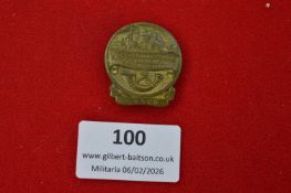 German forestry or regional association badge, circular form depicting axe and hunting horn motif,