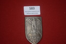 German WWII Cholm Shield, dated CHOLM 1942. Shield-shaped campaign badge with Wehrmacht eagle