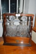 Tantalus with Two Cut Glass Decanters and Key