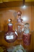 3x Cranberry Glass Stoppered Bottles
