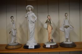 Four Figurines