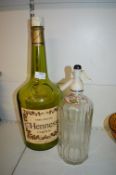 Decorative Hennesey Cognac Bottle, and a Peter’s Hull Soda Water Dispenser