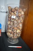 Large Glass Vase Containing Snail Shells