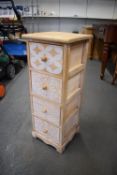Lightwood Chest of Four Drawer with Geometric & Floral Design