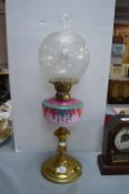Oil Lamp with Coloured Glass Painted Reservoir and Brass Stand