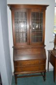 Edwardian Oak Bureau Bookcase with Leaded Glass Doors and Two Drawers