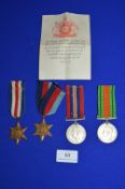 Set of Four WW2 Campaign Stars Including 1939 Star, Franch & Germany Star, Defence Medal, and a
