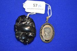 Large Carved Whitby Jet Brooch plus Reverse Cameo Glass Brooch