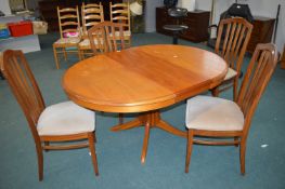 Stag Extending Oval Dining Table and Four Chairs