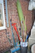 Assorted Garden Tools and a Parasol