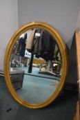 Gilt Framed Oval Bevelled Edge Mirror