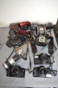 Vintage 35mm Film Cameras Including Praktica and Canon plus Lenses, etc.