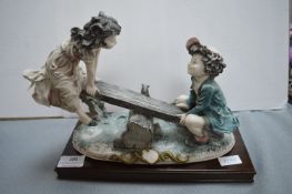 Capodimonte Style Figure of Two Children on a Seesaw