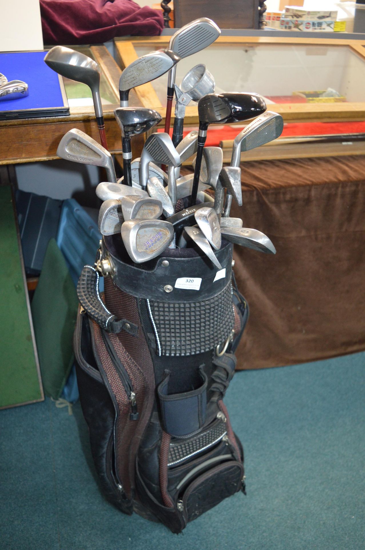 Golf Bag and Assorted Vintage Golf Clubs