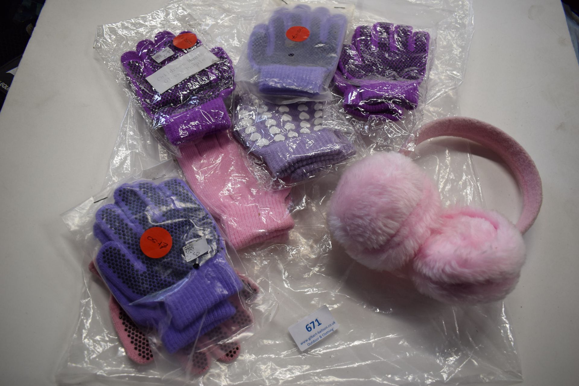 6x Pairs of Various Children’s Grip Gloves, and 1x Pair of Pink Fluffy Earmuffs