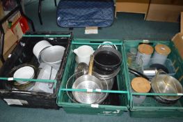 Assorted Kitchenware Including Bowls, Pans, and Storage Tins