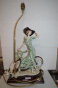 Table Lamp Featuring a Lady with a Bicycle