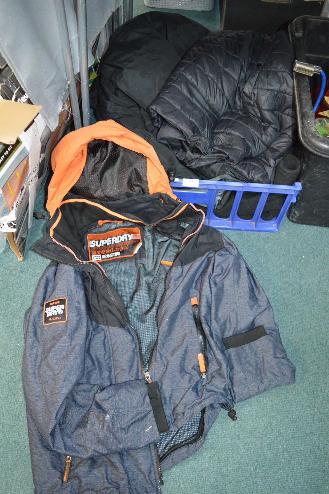Quantity of Men’s Outdoor Jackets Including Super Dry